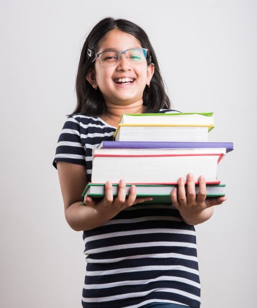 cute-studious-little-indian-asian-girl-holding-studying-reading-book-while-standing-isolated-white-background1